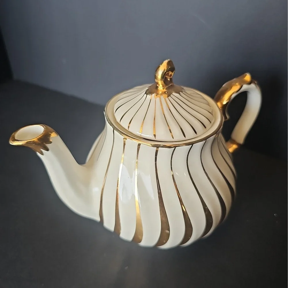 Sadler england gold